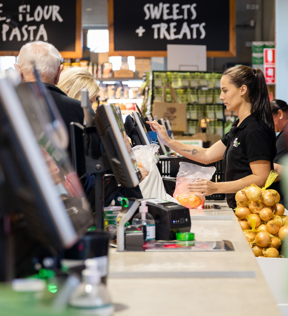 Customers being served at Nowra Fresh Market Cash Registers